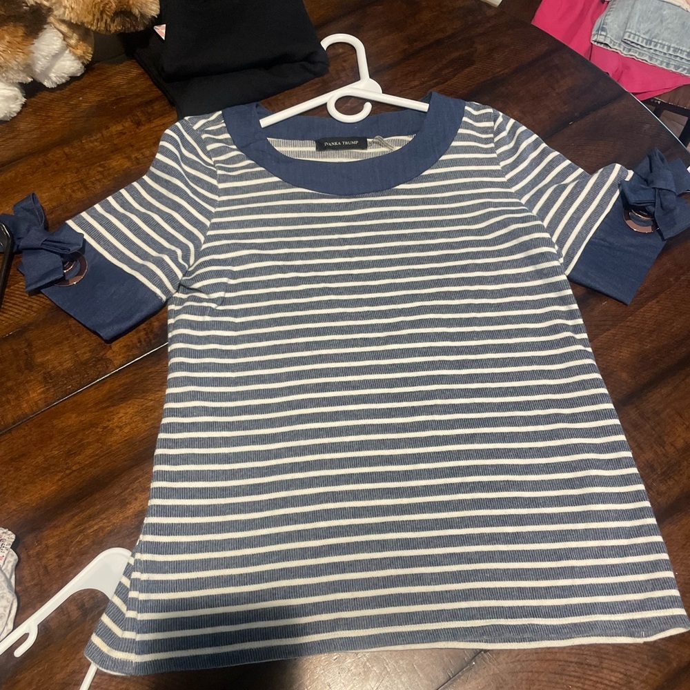 Blue and White Striped Shirt with gold buckles and bows